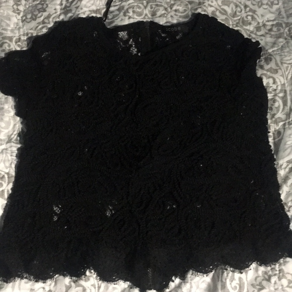 A see-through black shirt